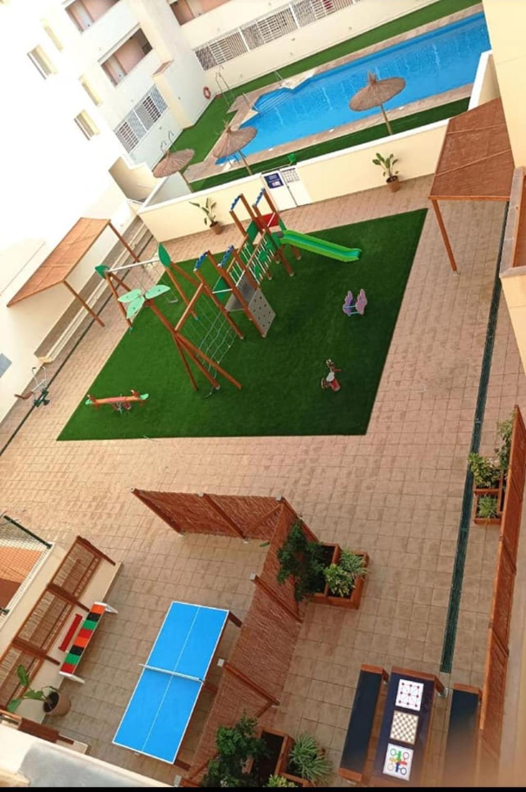 Lyrioshomes Beach Roquetas De Mar , Piscina Y Parque Infantil Chambre photo